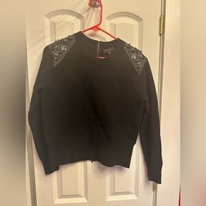J. Crew Black sweater with gray, jeweled shoulder patches, size small